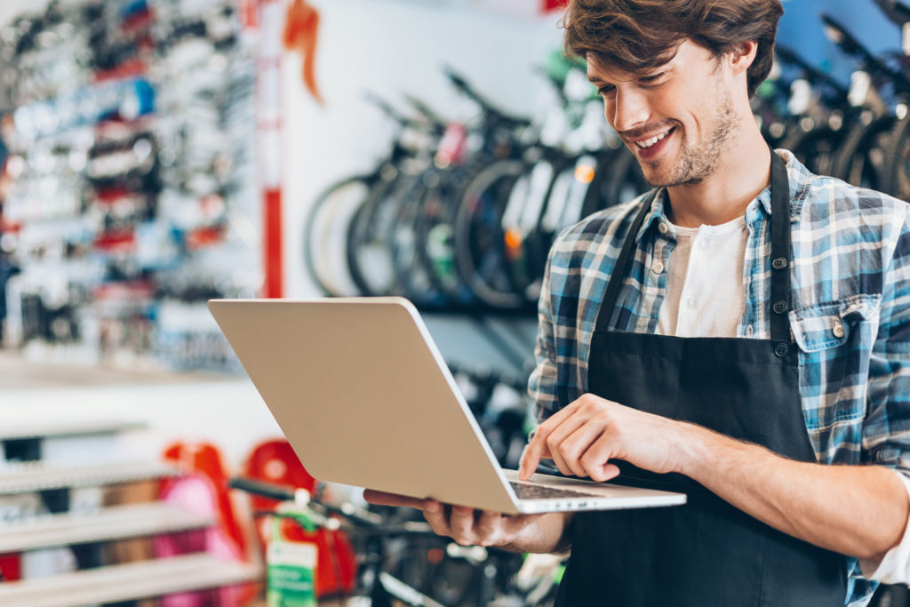 Bicycle store owner posting on social media